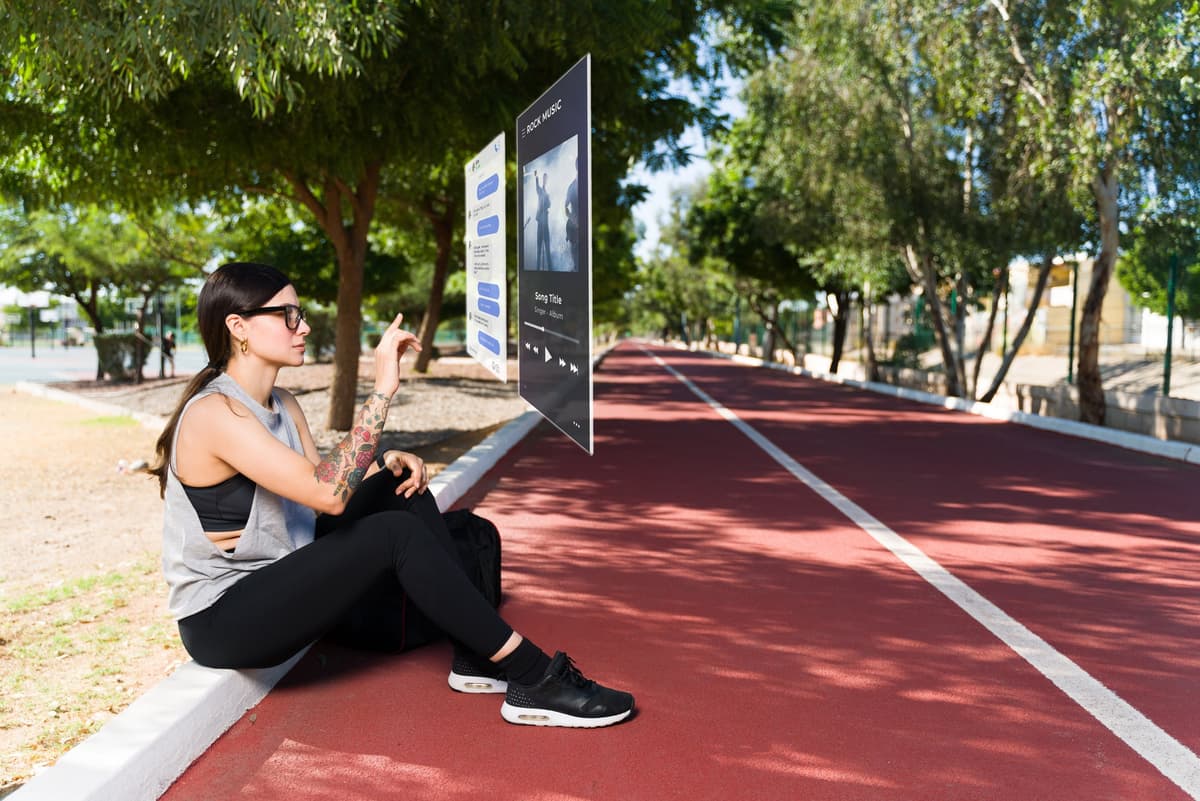 Woman in athleisure using a xr interface